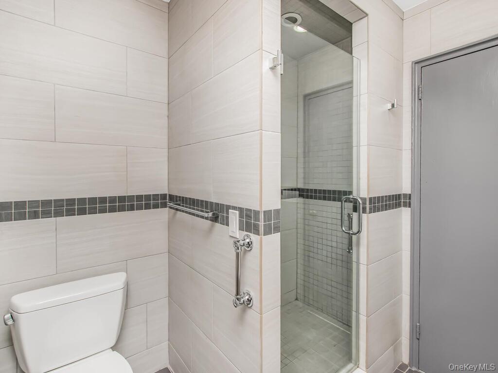 Bath with separate shower and tub
