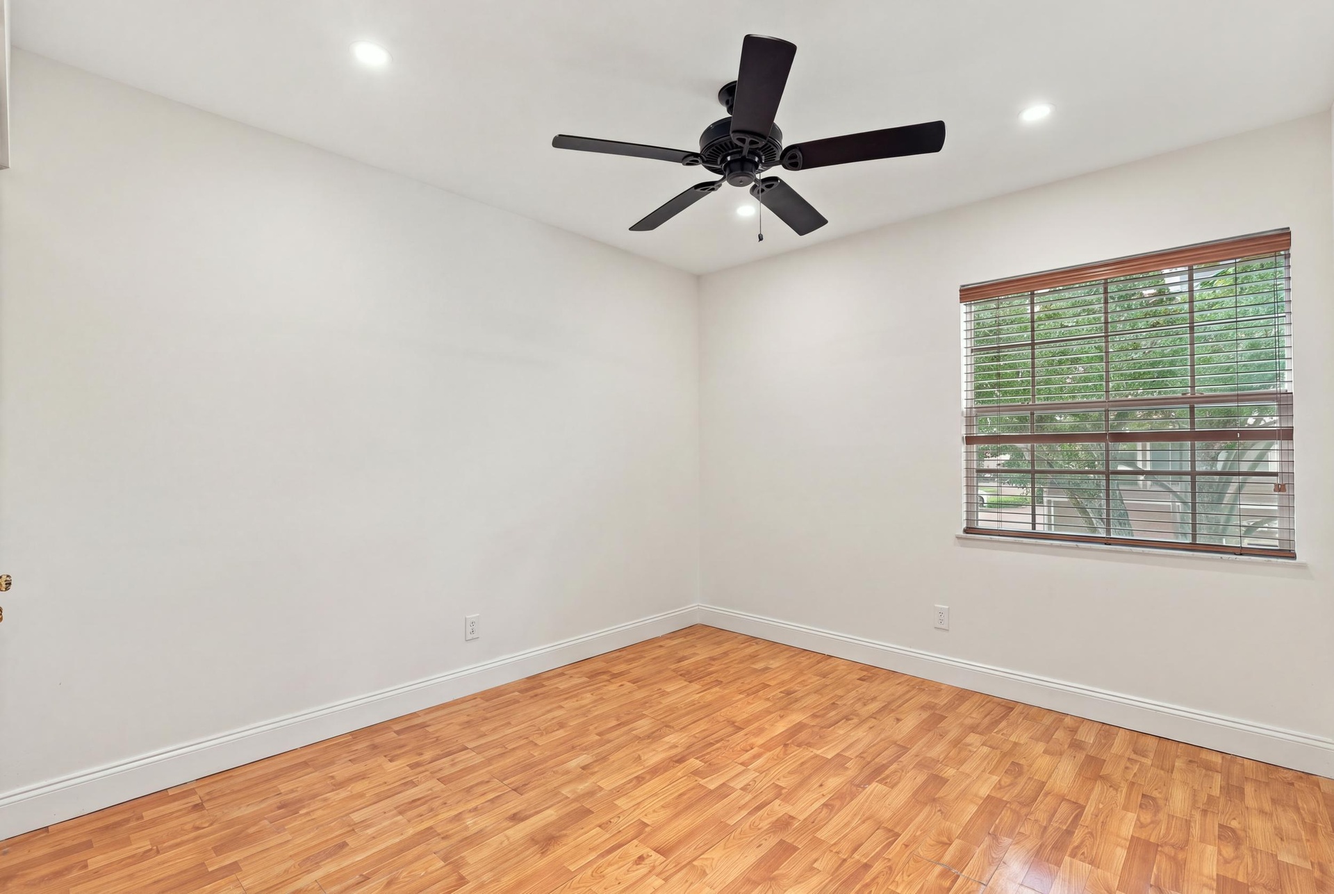 Both upstairs guest bedrooms are generously sized and filled with natural light, offering ample closet space and comfortable accommodations for family