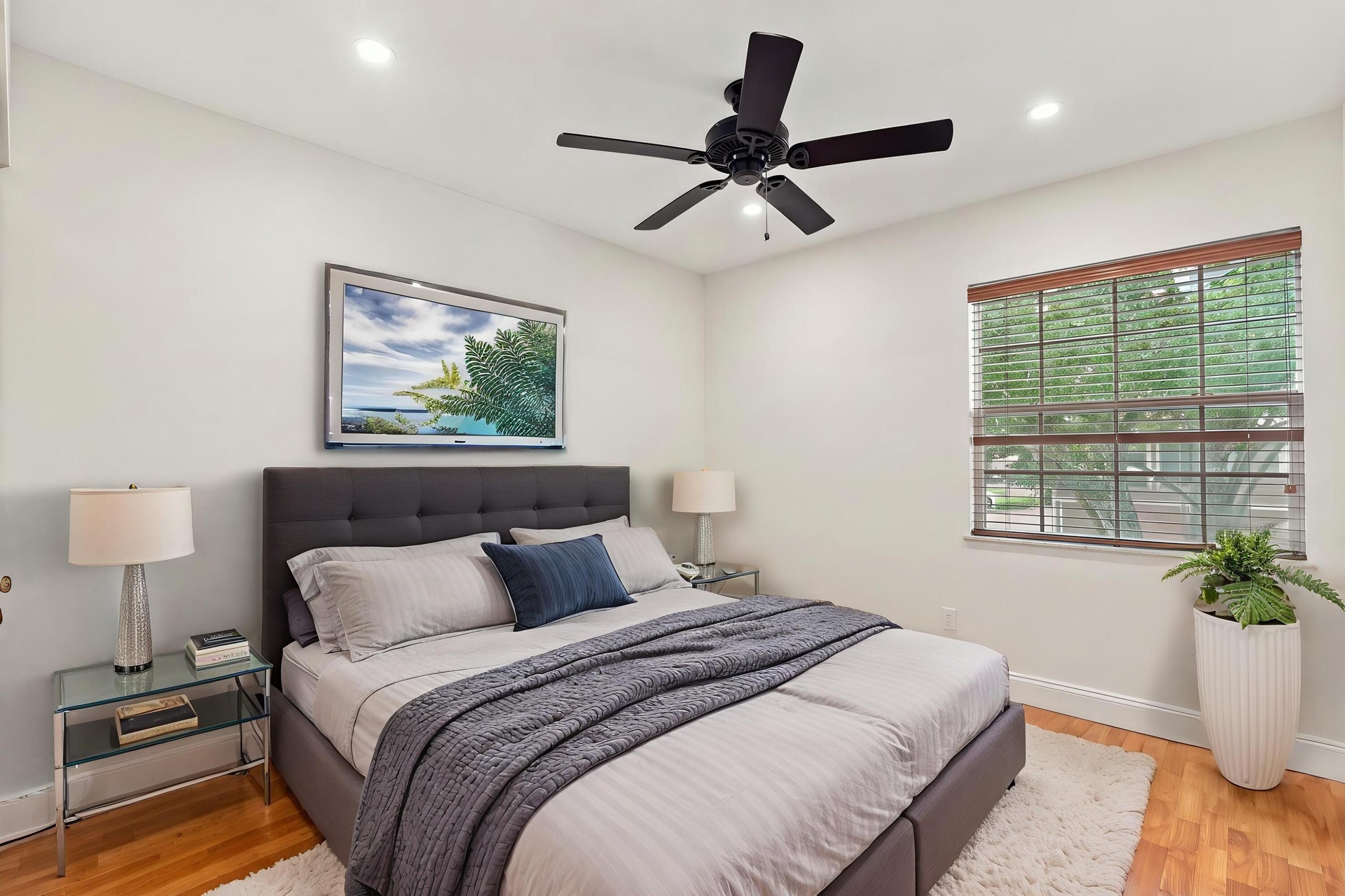 Both upstairs guest bedrooms are generously sized and filled with natural light, offering ample closet space and comfortable accommodations for family