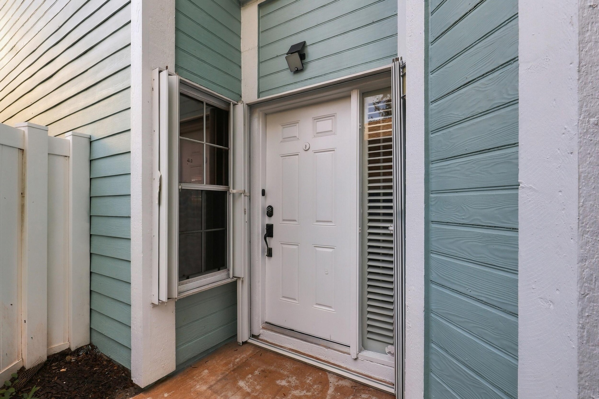 Before you step inside, you are welcomed by the charm of Fairfield, a gated community in Central Boca Raton featuring mature oak trees and an impressi