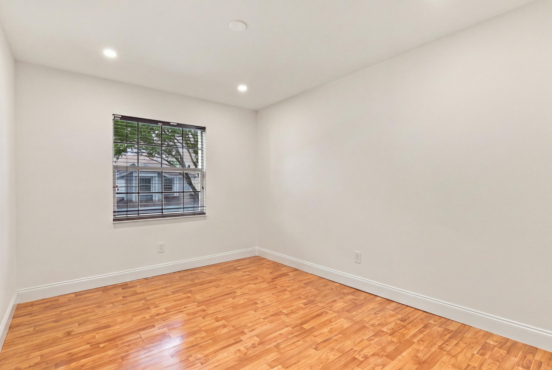 Both upstairs guest bedrooms are generously sized and filled with natural light, offering ample closet space and comfortable accommodations for family