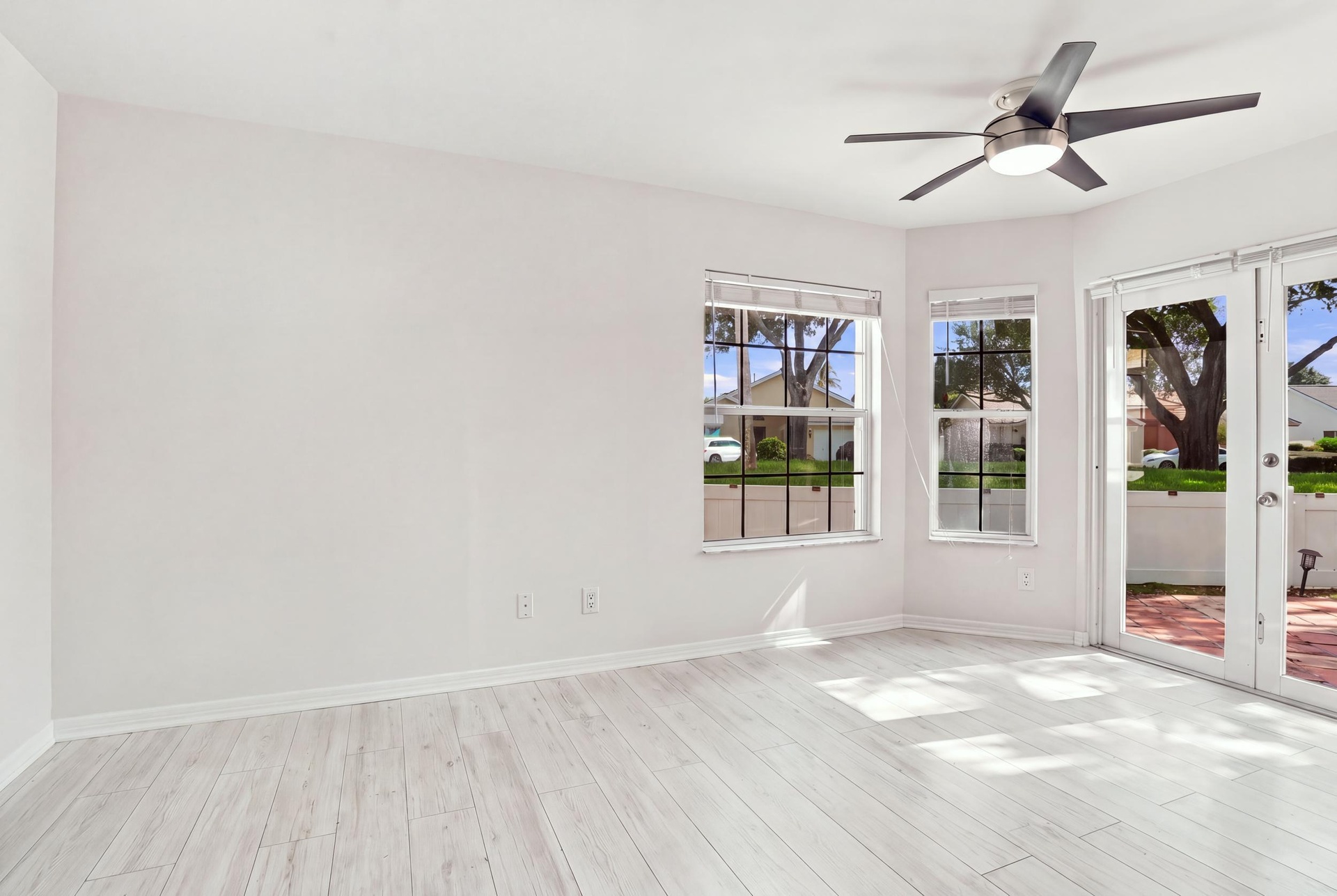 The charming eat-in dining area provides a relaxed and convenient setting for casual meals, surrounded by natural light with sliding glass doors openi