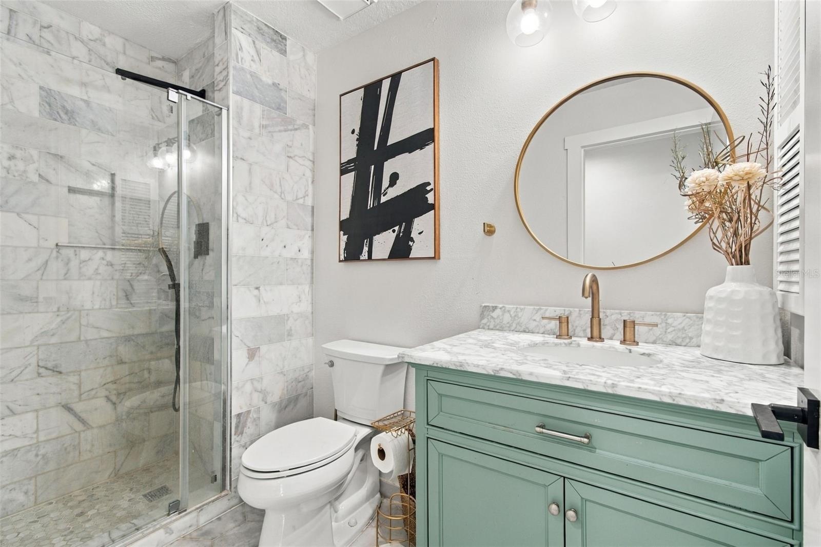 Guest bathroom off the kitchen, pool bathroom
