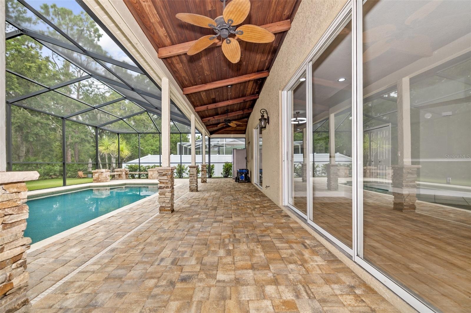 Beautiful pavers and tongue and grove ceiling!