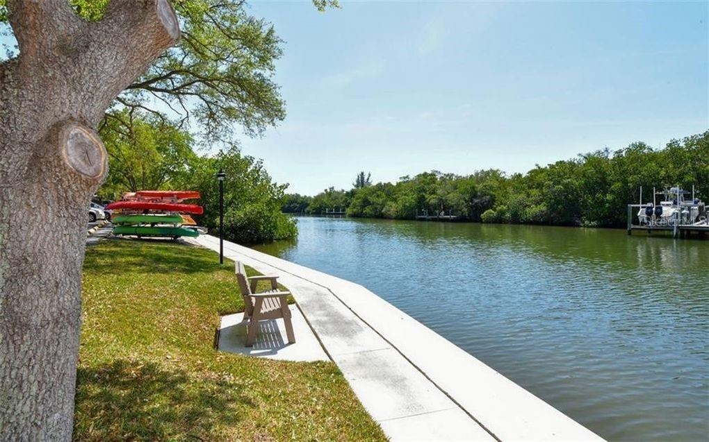 Five plus acres of lush tropical grounds, surrounded by water on 3 sides.