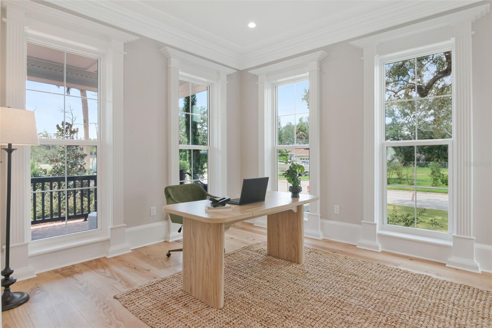 Home office features a fireplace too!