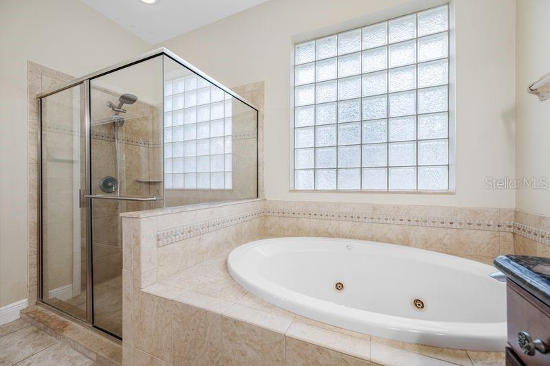 Primary Bath with Jetted Tub & Walk in Shower