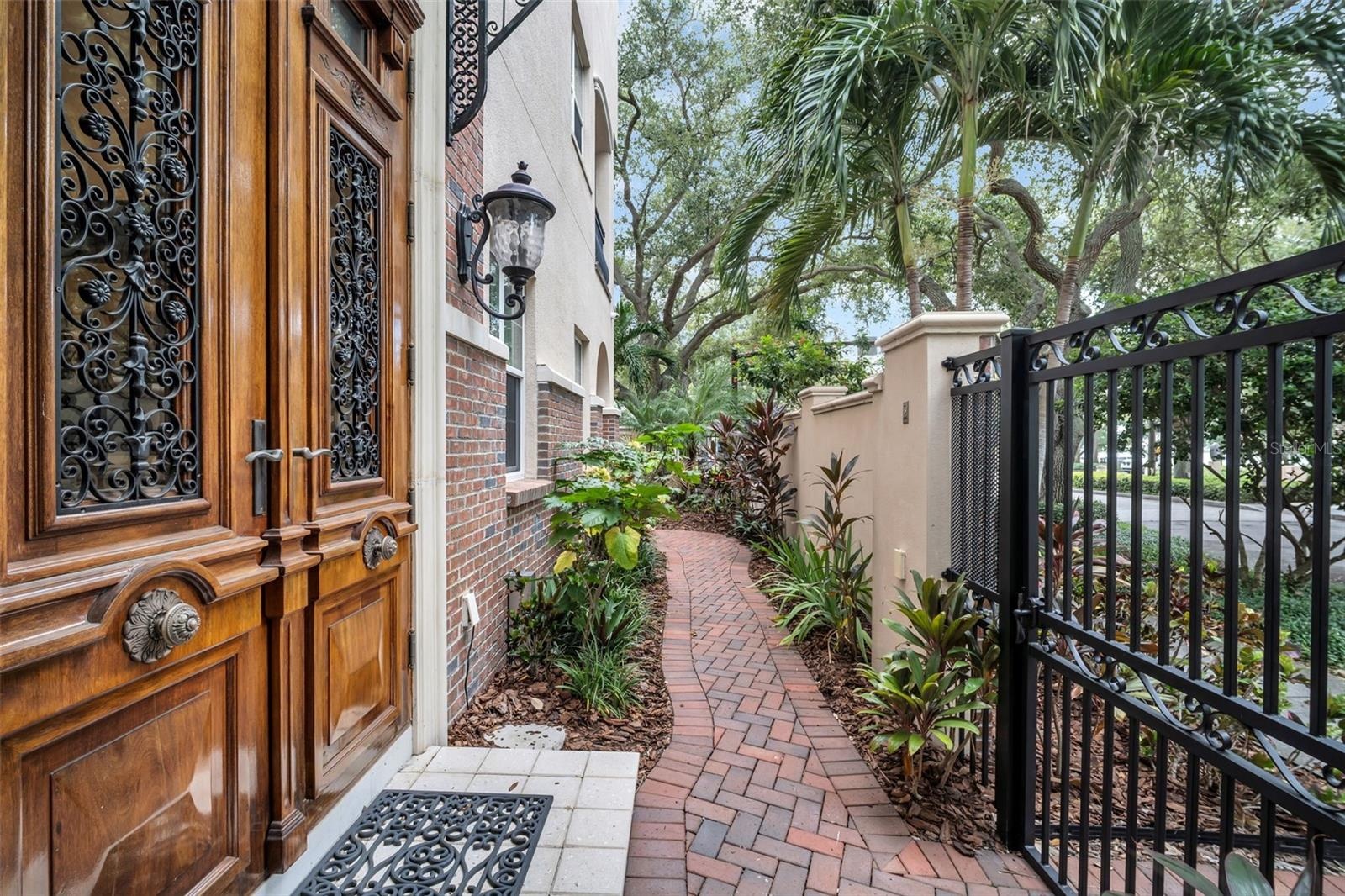 5th Ave NE side entrance with secure gate