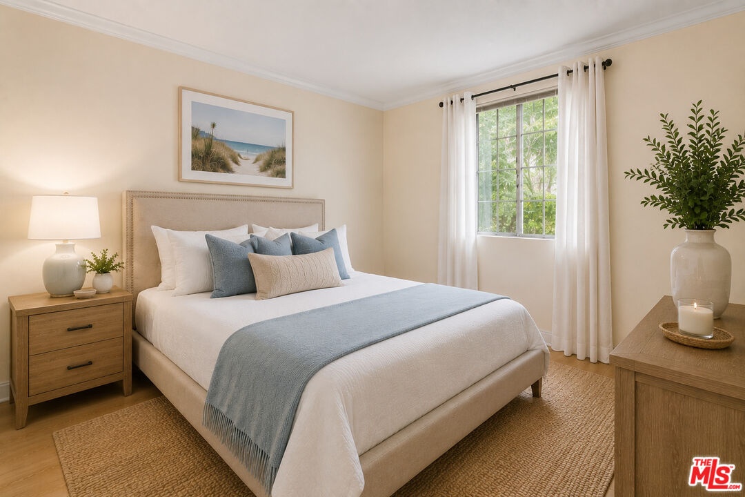PRIMARY BEDROOM WITH HARDWOOD