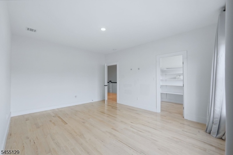 BEDROOM 3 W/ WALK IN CLOSET