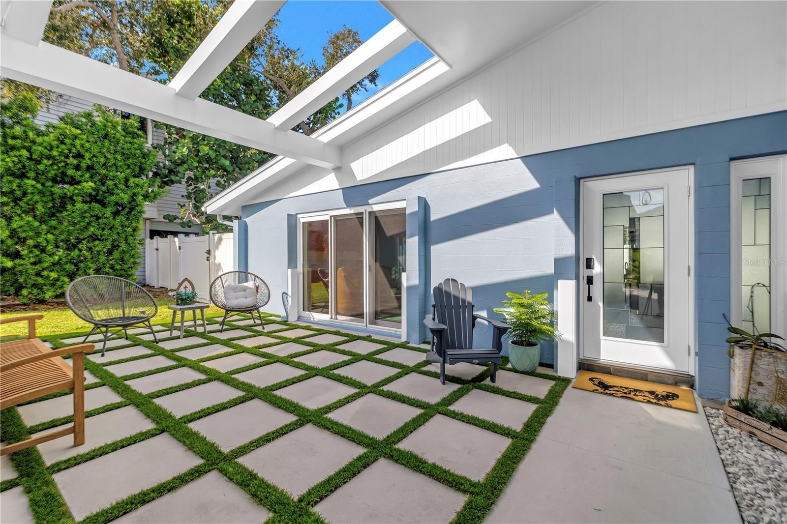 Mid century modern architecture weclomes you and guests in your front courtyard.