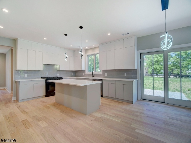 Kitchen overlooks Backyard
