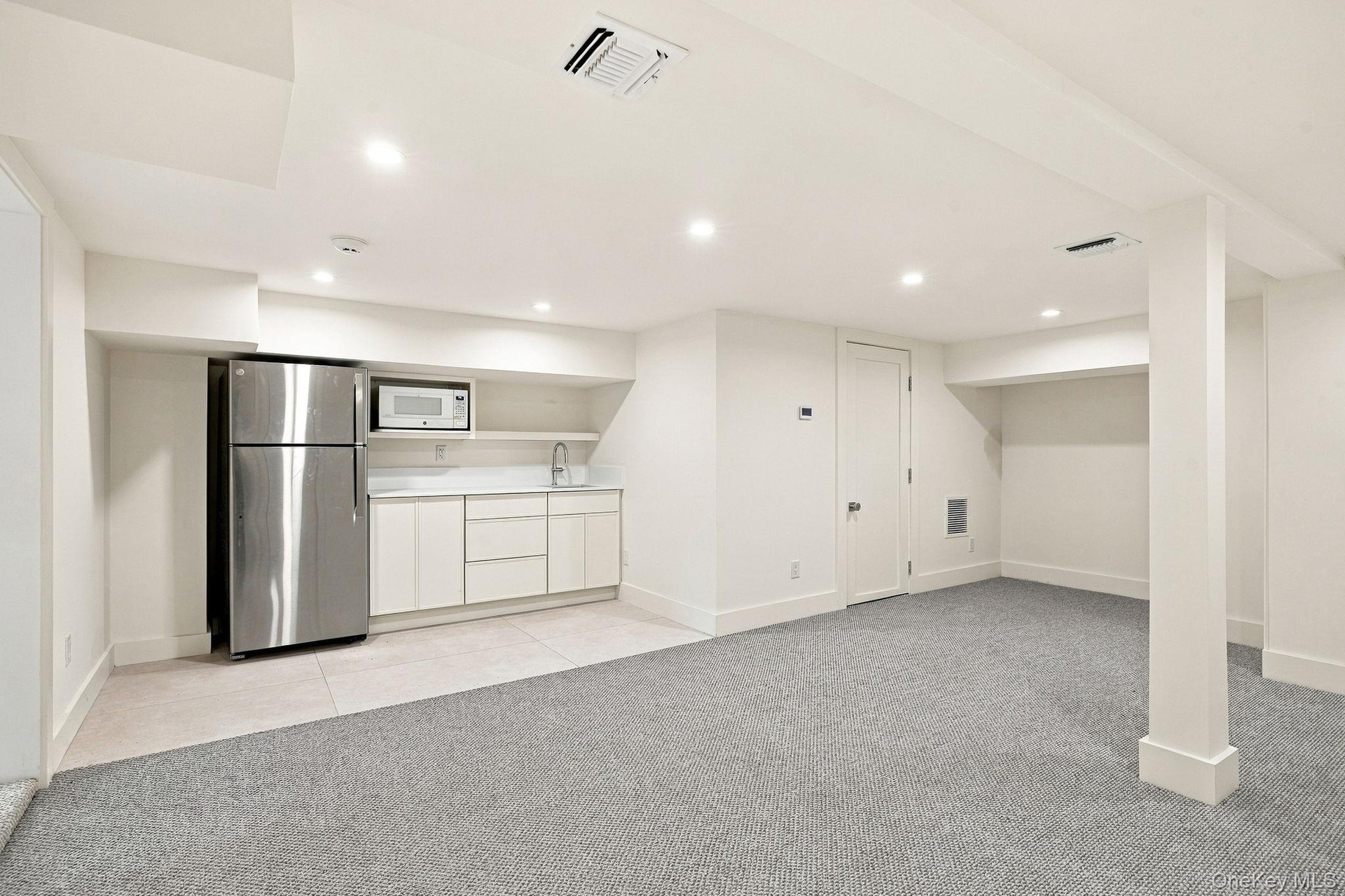 lower level wet bar and den