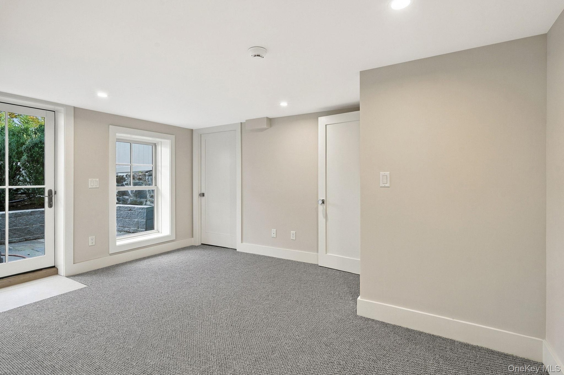 lower level bedroom walk-out to patio