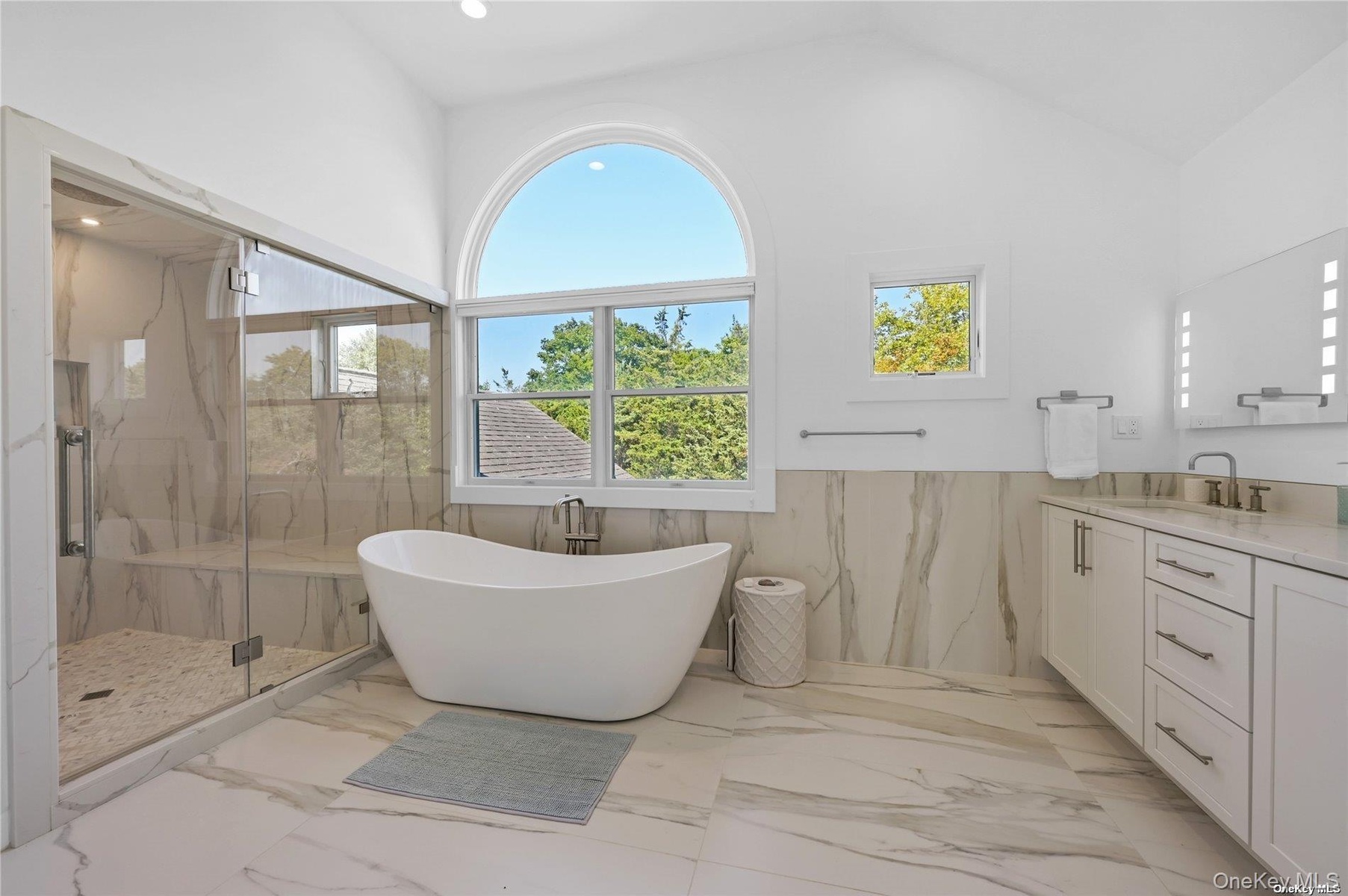 Primary- steam shower, soaking tub