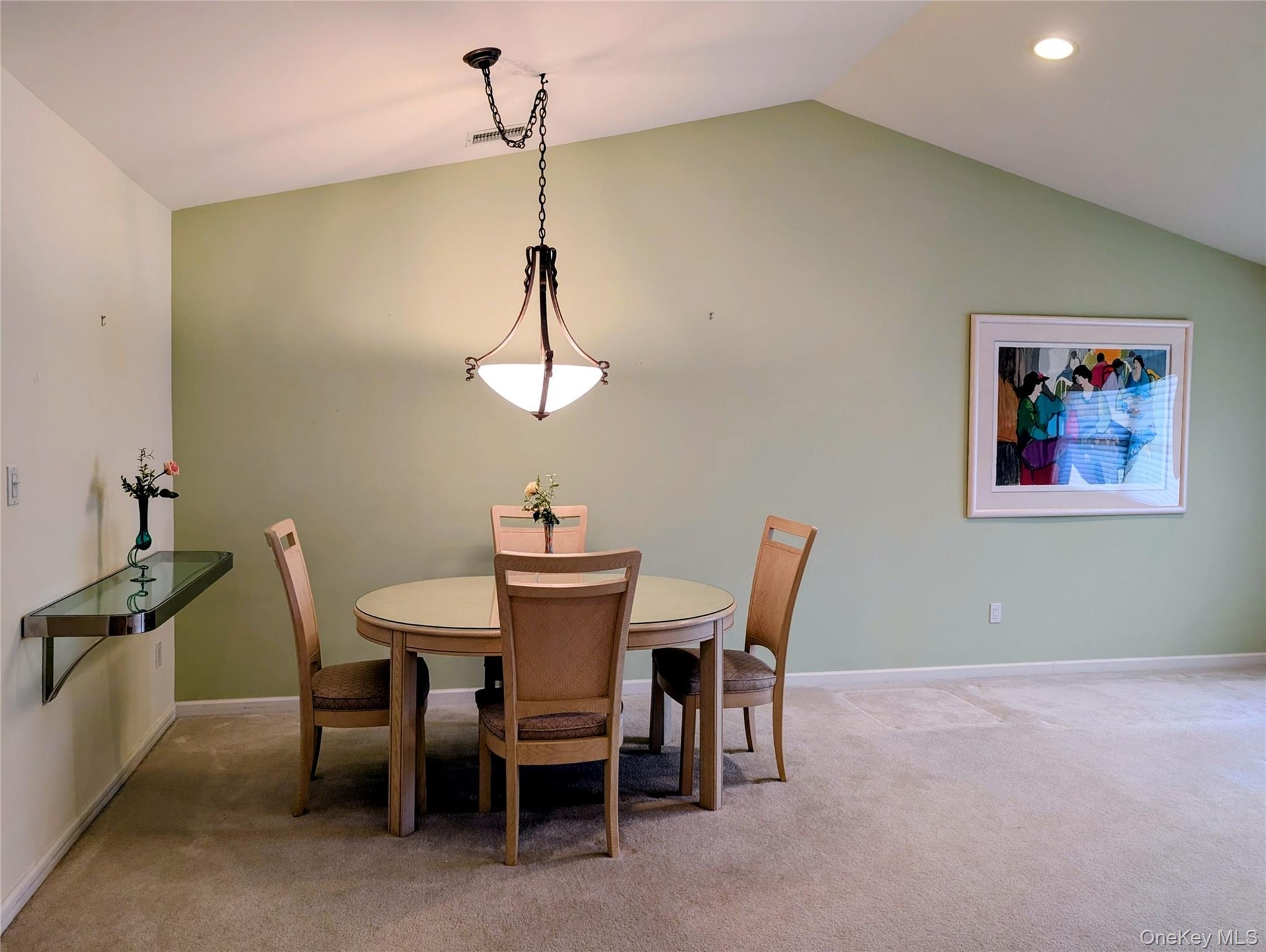 Dining Room With Vaulted Ceiling