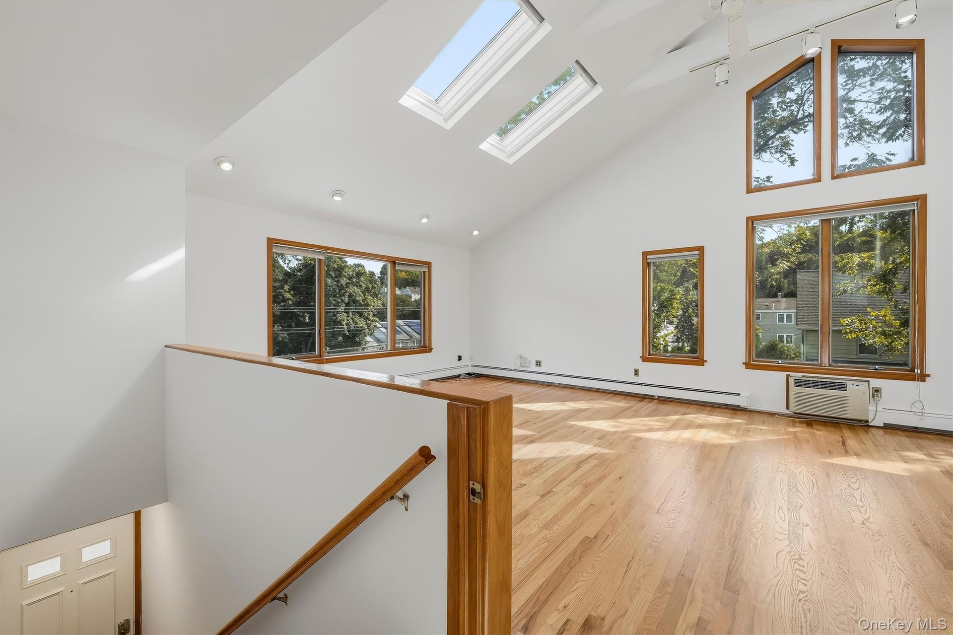 Unit 2 - Vaulted Ceilings, Skylights, Palladian Windows, Hardwood Floors