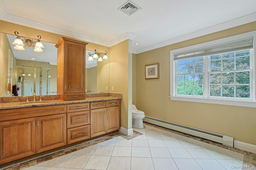 Elegant Primary Bath W/Porcelanonsa Imported Designer Tile,  Maple Cabinetry W/Glaze