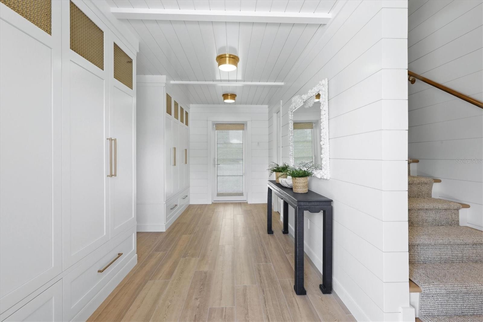 Beautifully designedd front entry with custom designed cabinetry