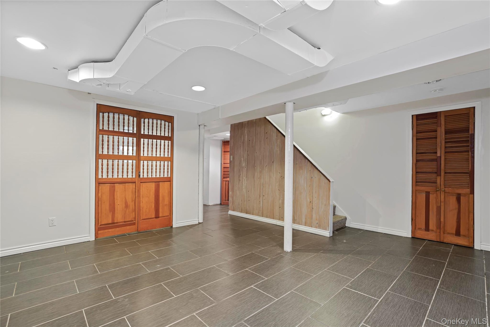 Partially Finished Lower Level With Office & Separate Storage Room