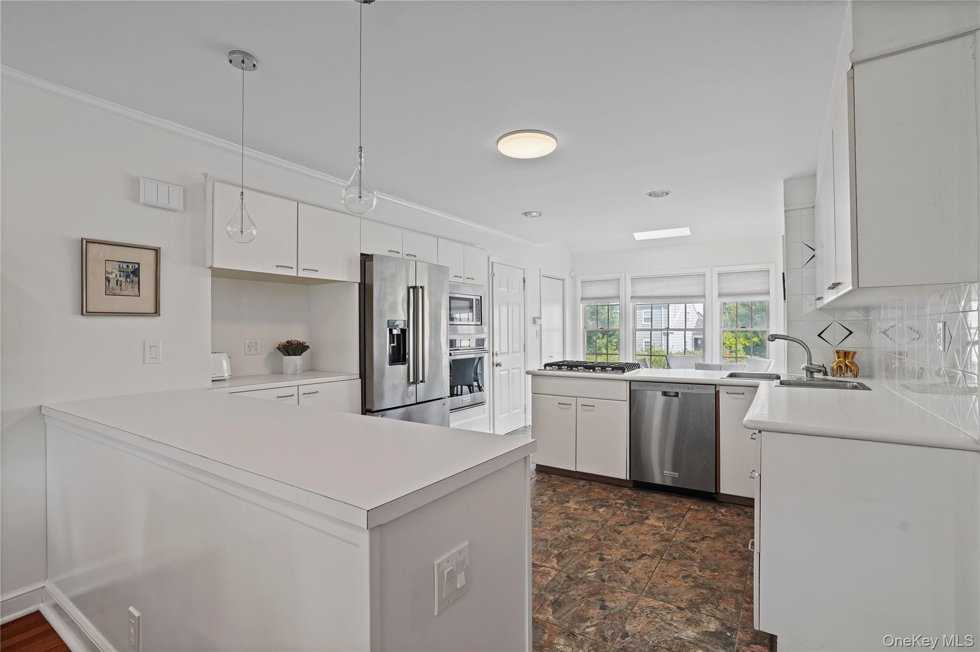 Large Open Kitchen With Plenty Of Storage & Prep Space