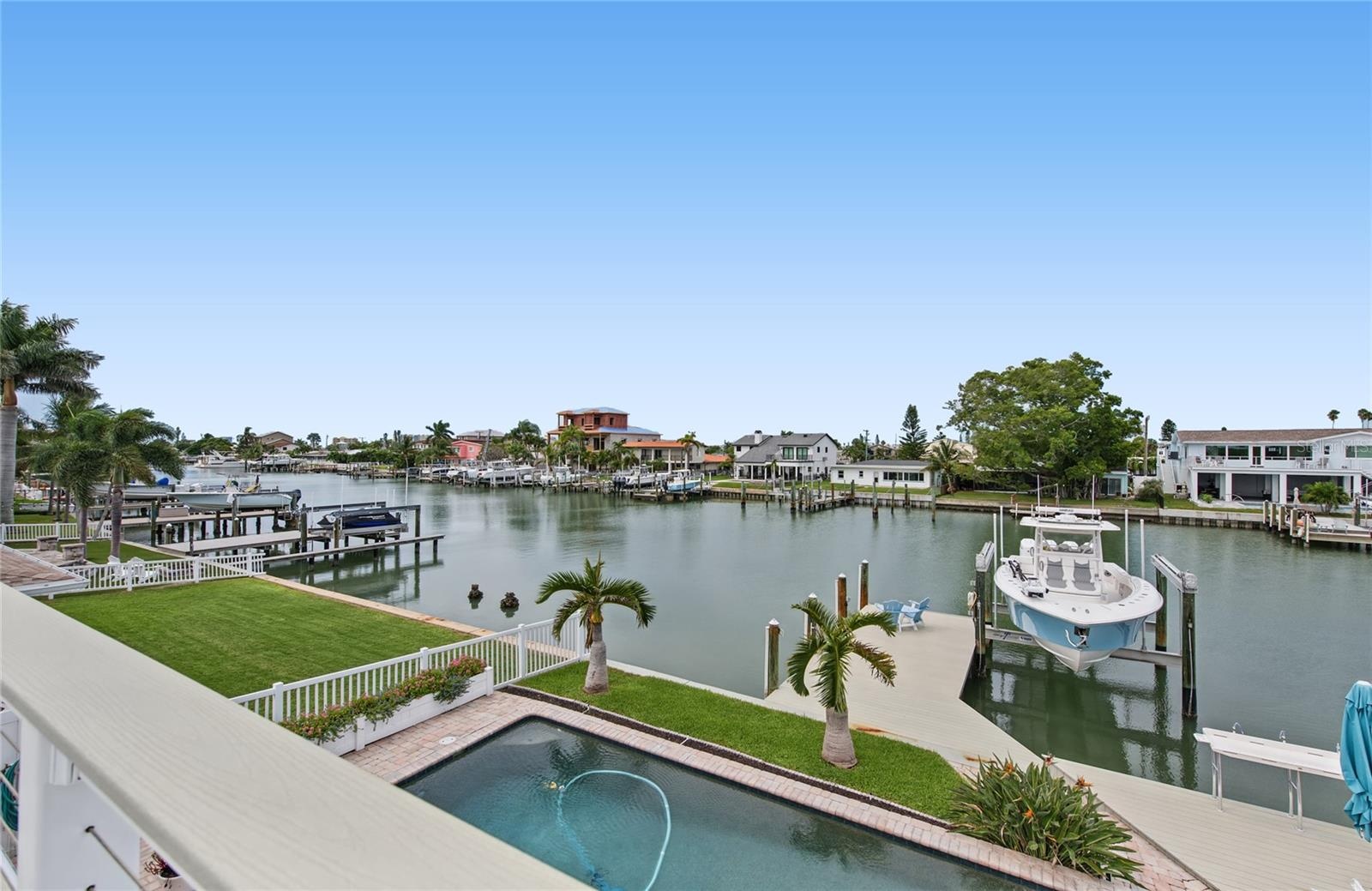 544 Lillian Dr, Madeira Beach - view of pool from balcony Primary bedroom