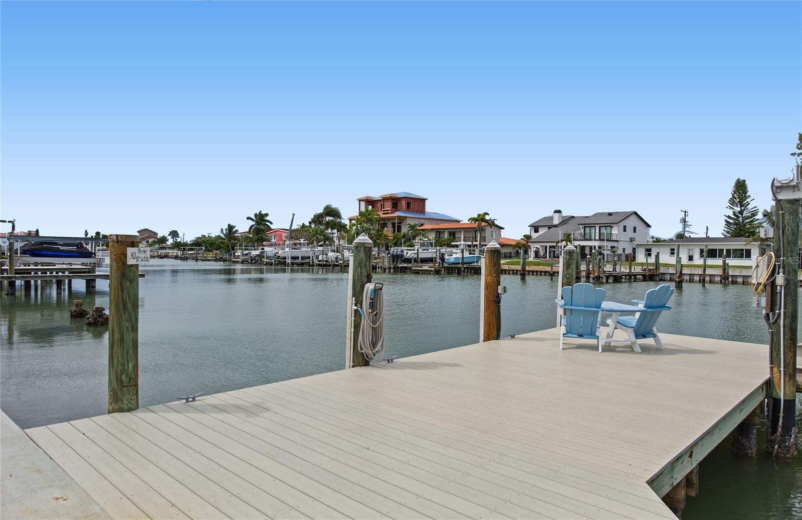 544 Lillian Dr, Madeira Beach composite dock. Deck chairs do not convey
