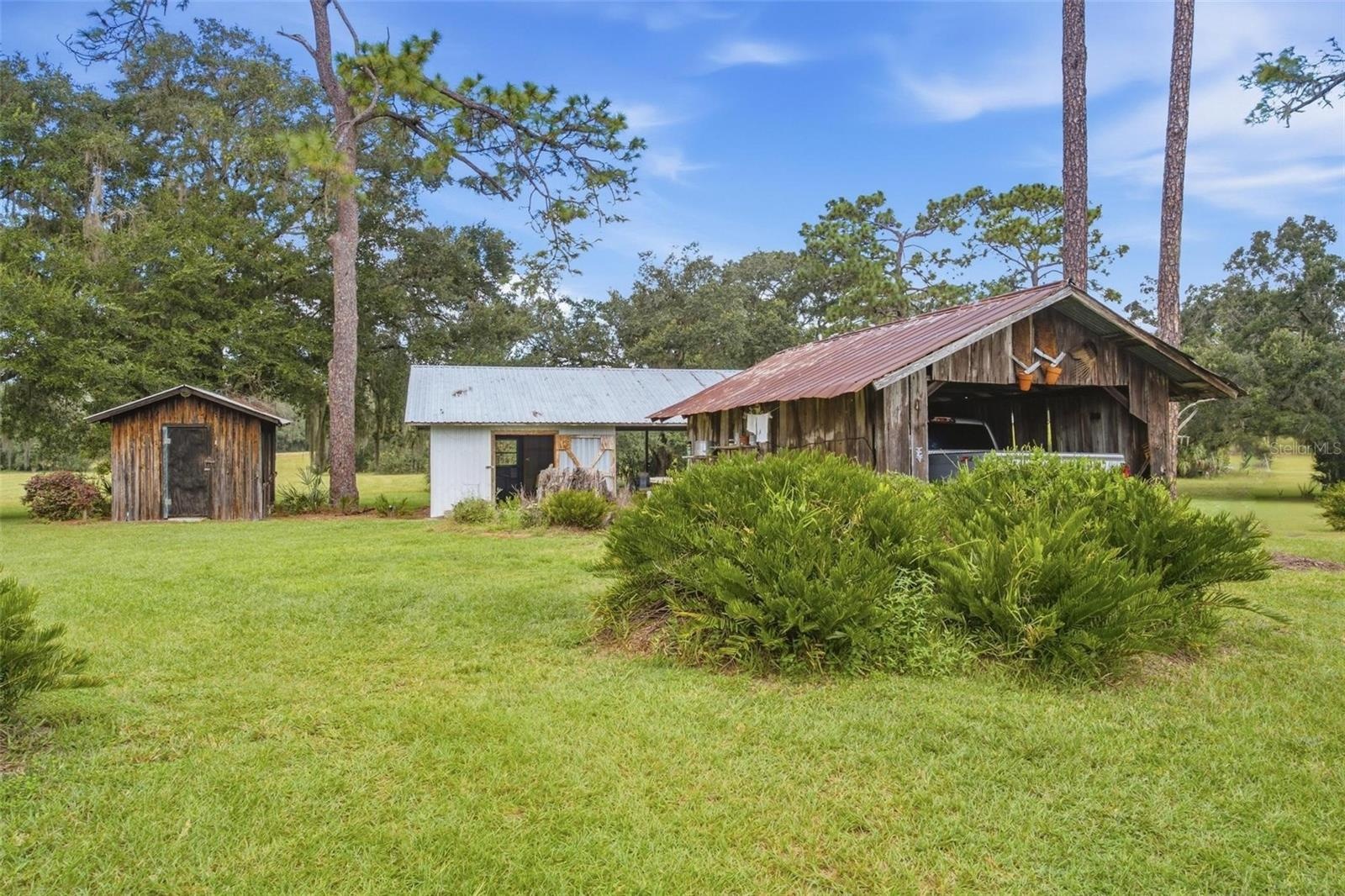 Carport, shed row and cabin