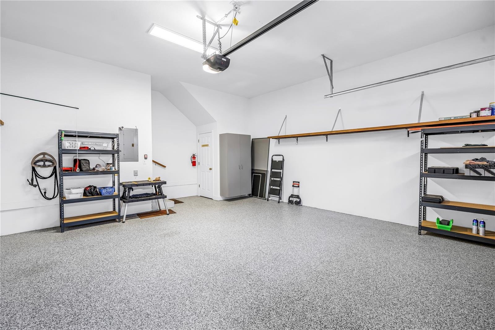 Garage with beautiful coated concrete floor