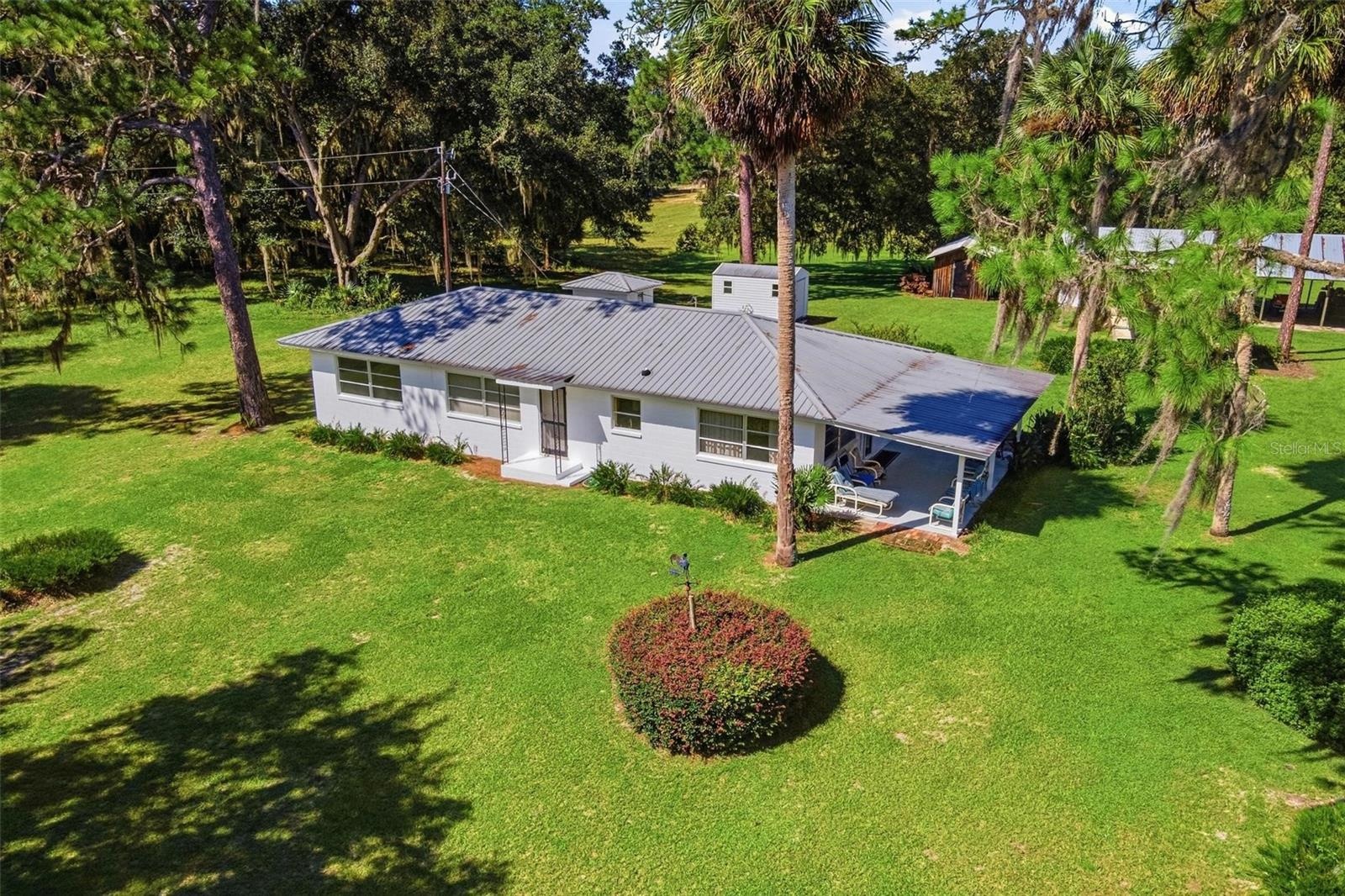 Old Florida Setting, yet a Concrete Block House with a Metal Roof
