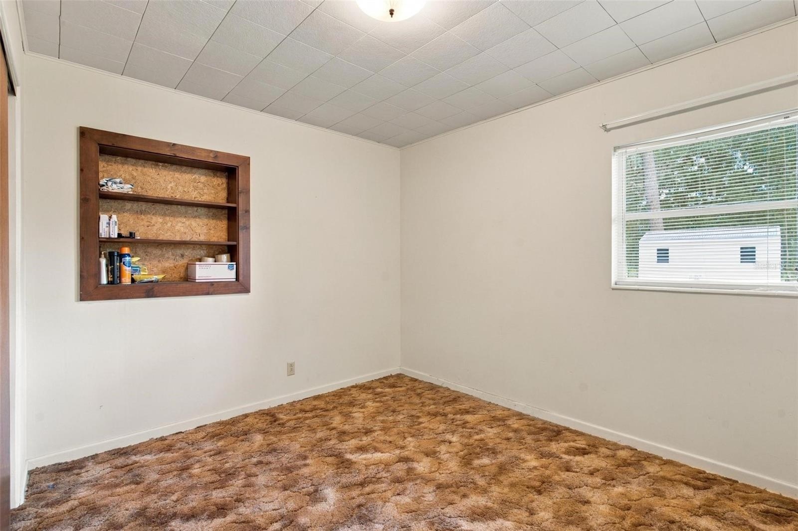 BedRm 3 Terrazzo under carpet