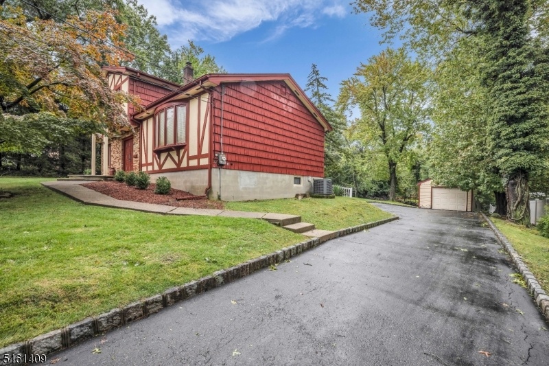 Long driveway with garage!