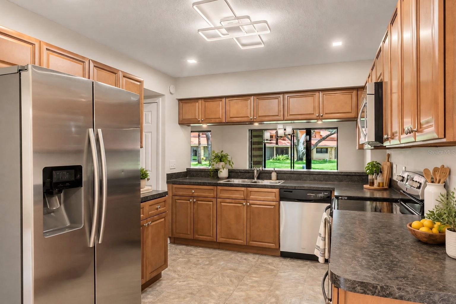 Stainless steel appliances and a practical kitchen layout.