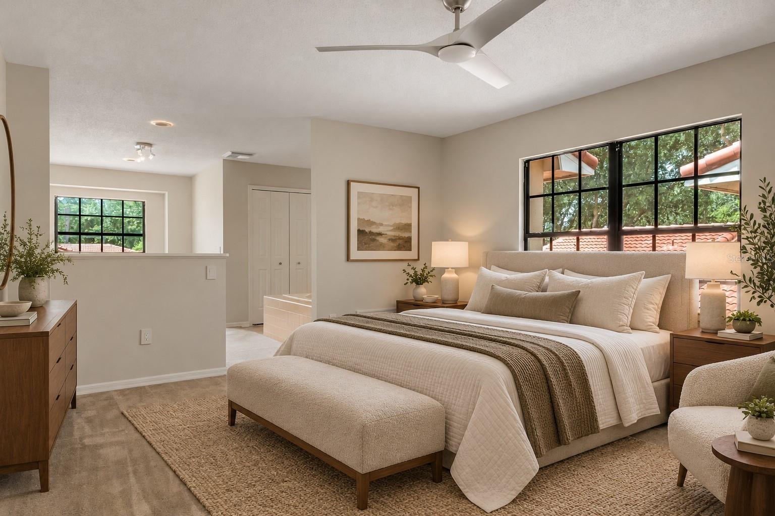 Spacious primary bedroom with room for additional seating