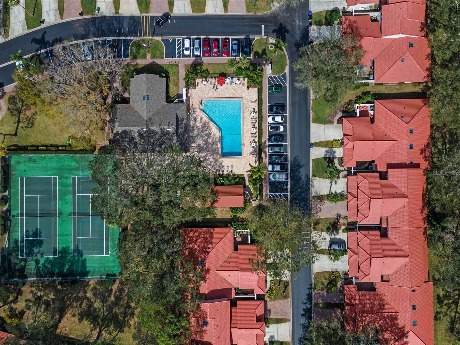 Community recreation areas with tennis courts and space for outdoor games.