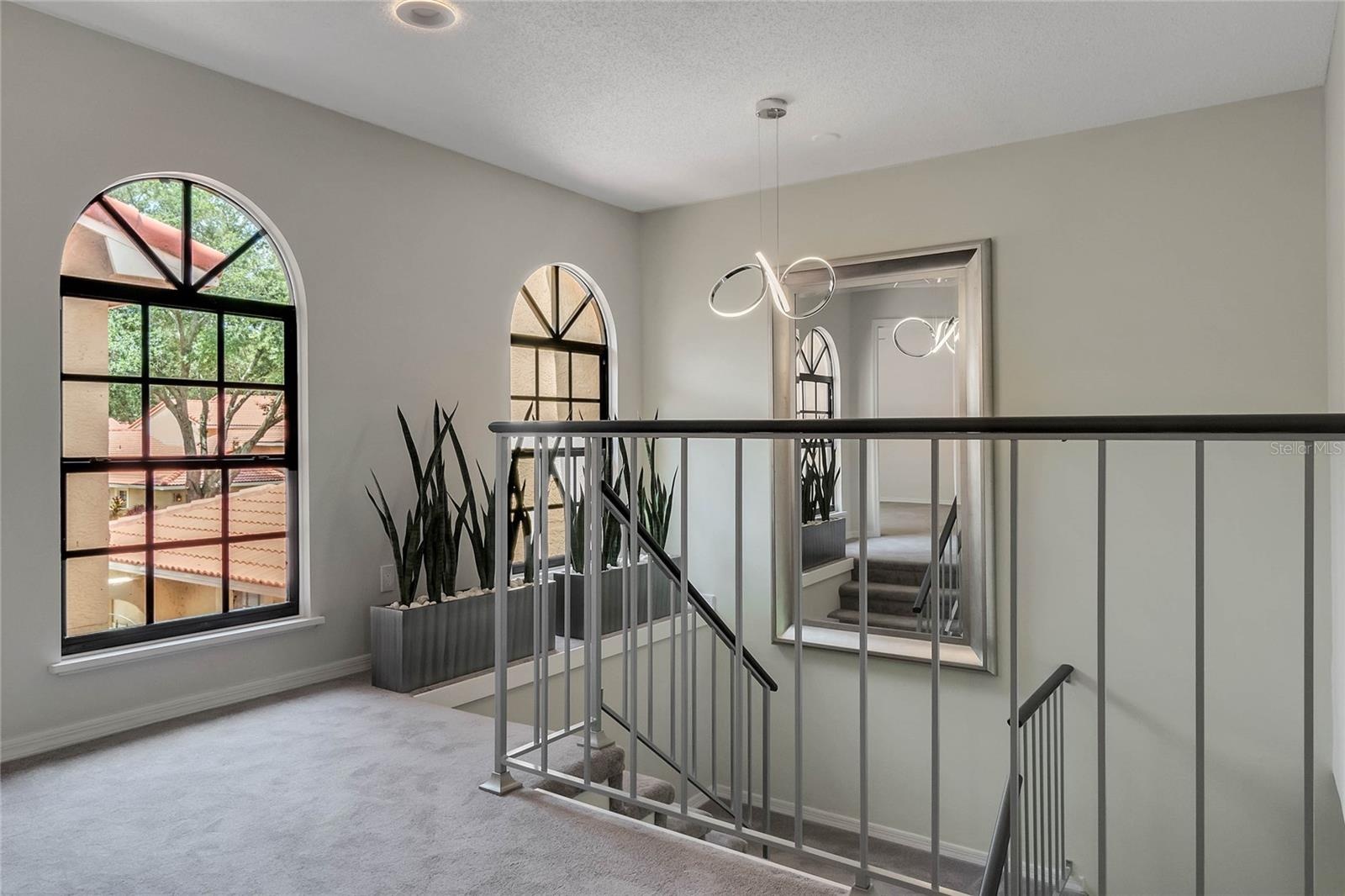 Updated carpet and stairway railing