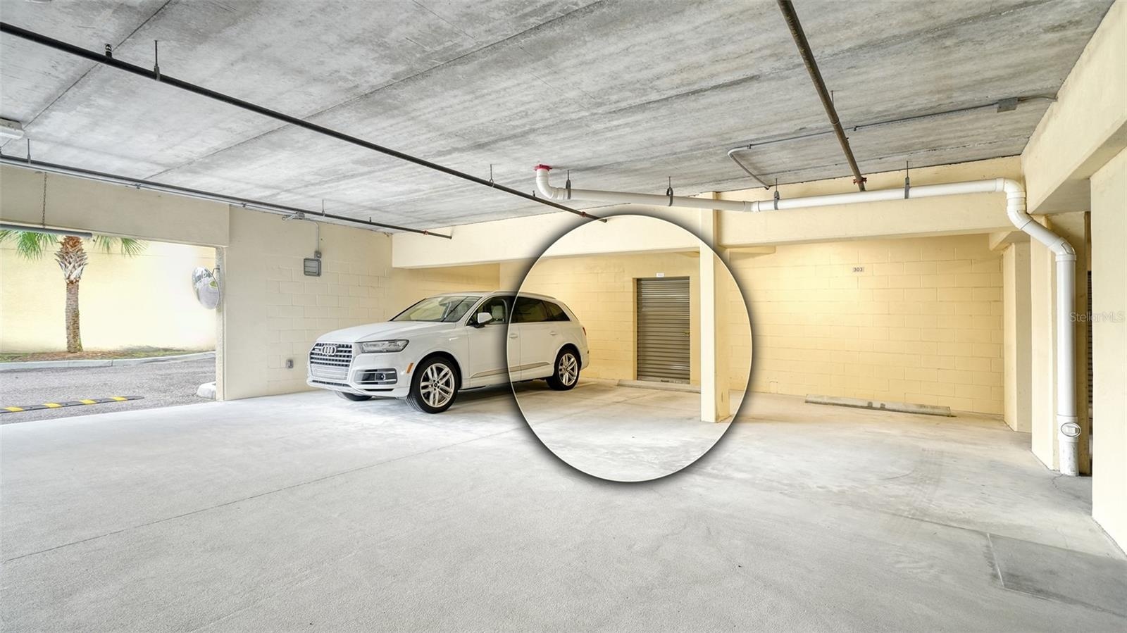 The parking space under the building and the storage unit.