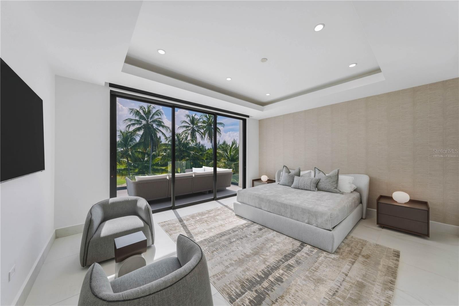 Guest Bedroom - The terrace that connects to the bedroom in this image has been virtually staged and does not reflect the current state of the propert