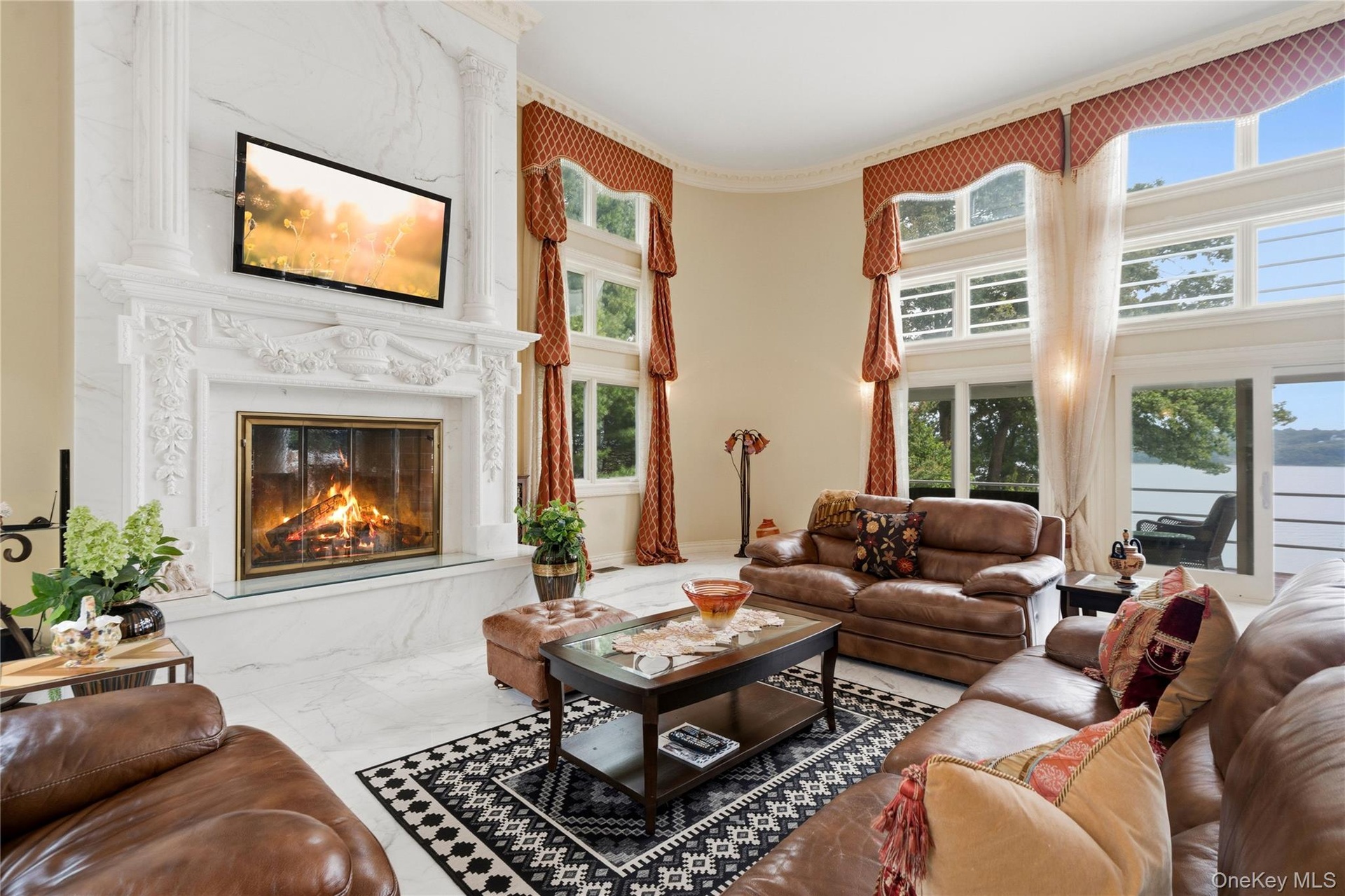 Marble fireplace, walls of glass