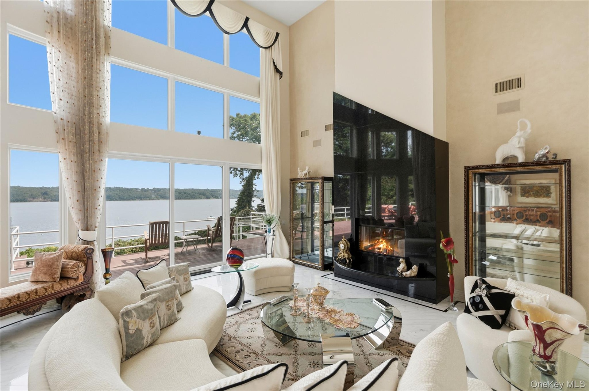Great room, walls of glass-panoramic water-views
