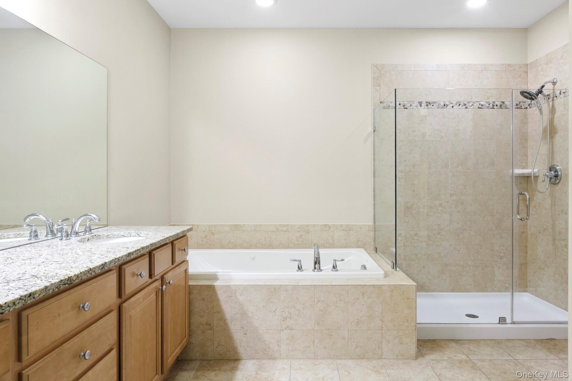 Double Vanity, Jacuzzi tub, Shower and water closet