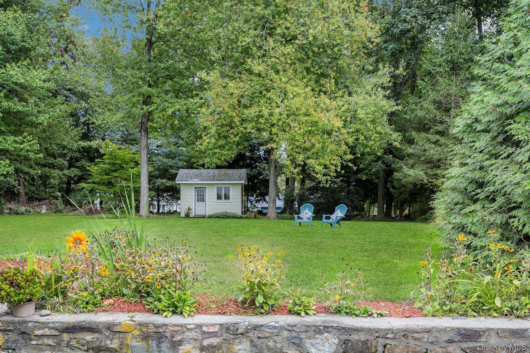Stone Wall w/gardens