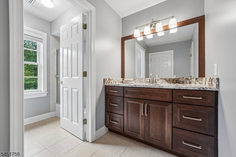 Bedroom Five ensuite bath