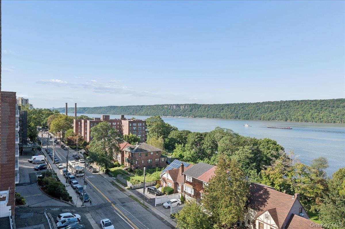 Unobstructed terrace Hudson River view spans from the George Washington Bridge to the Tappan Zee