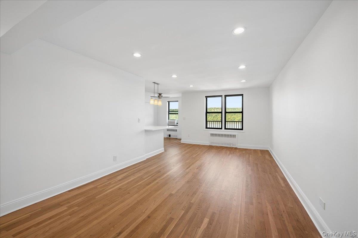 Spacious living room with recessed lighting and spectacular view!