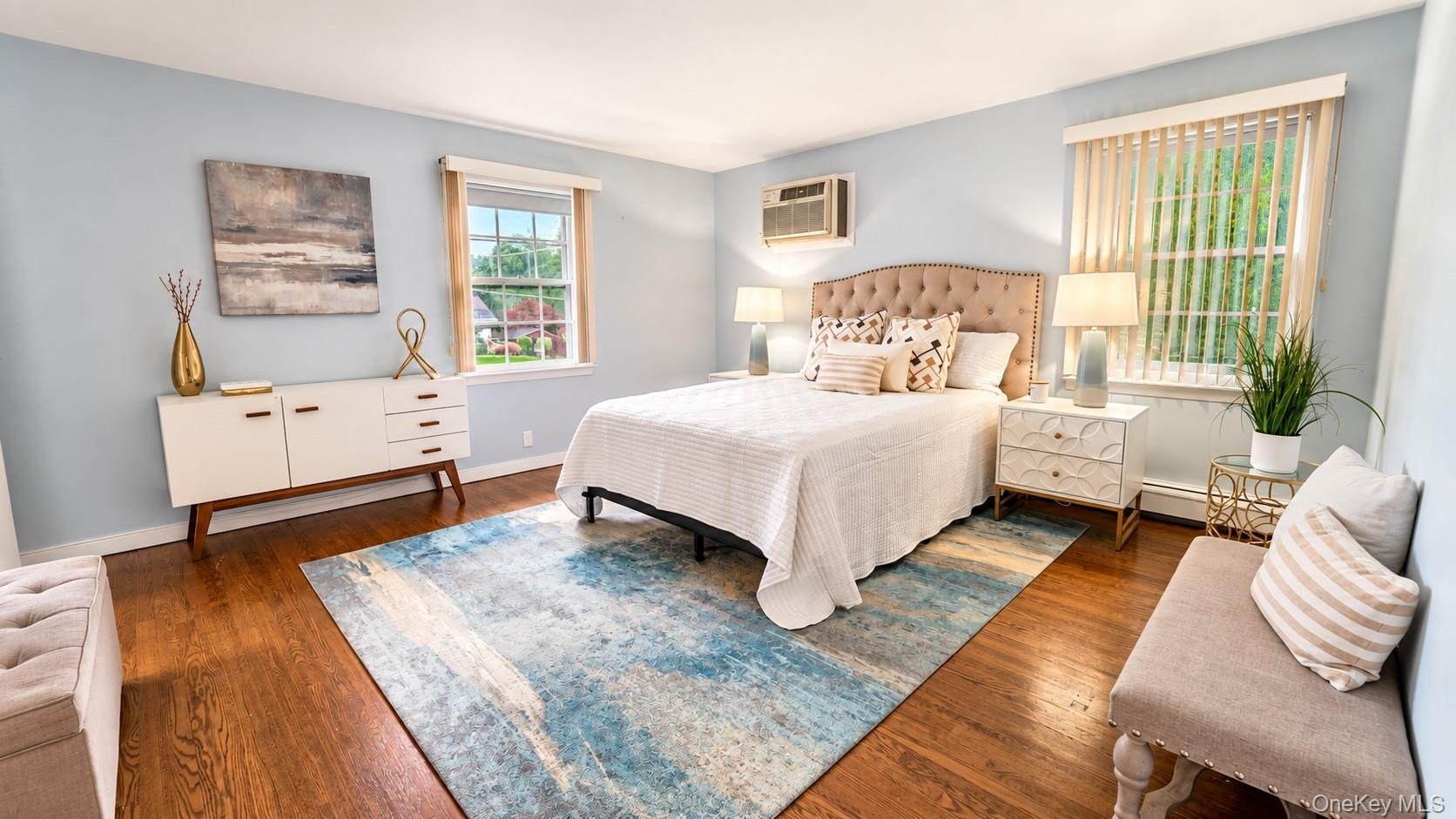 The expansive primary bedroom offers generous closet space and a private en-suite bath, creating a comfortable and inviting retreat at the end of the 