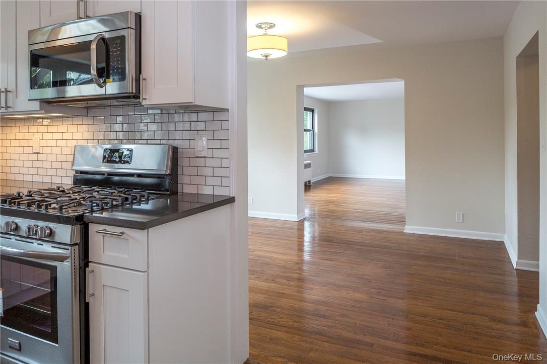 Kitchen adjoins separate dining room and huge living room.