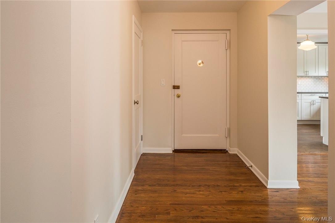 Apartment entry with separate coat closet