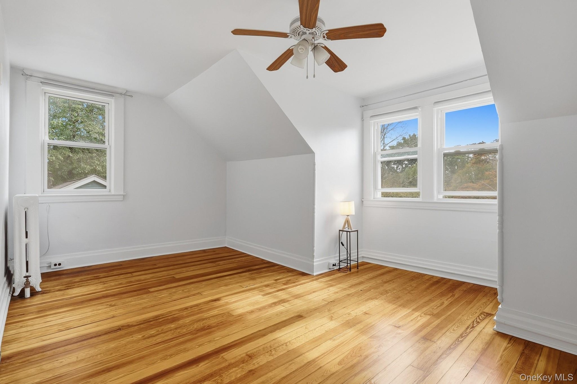 Newly refinished wood floors in the bedrooms, with ceiling fan and tons of natural light