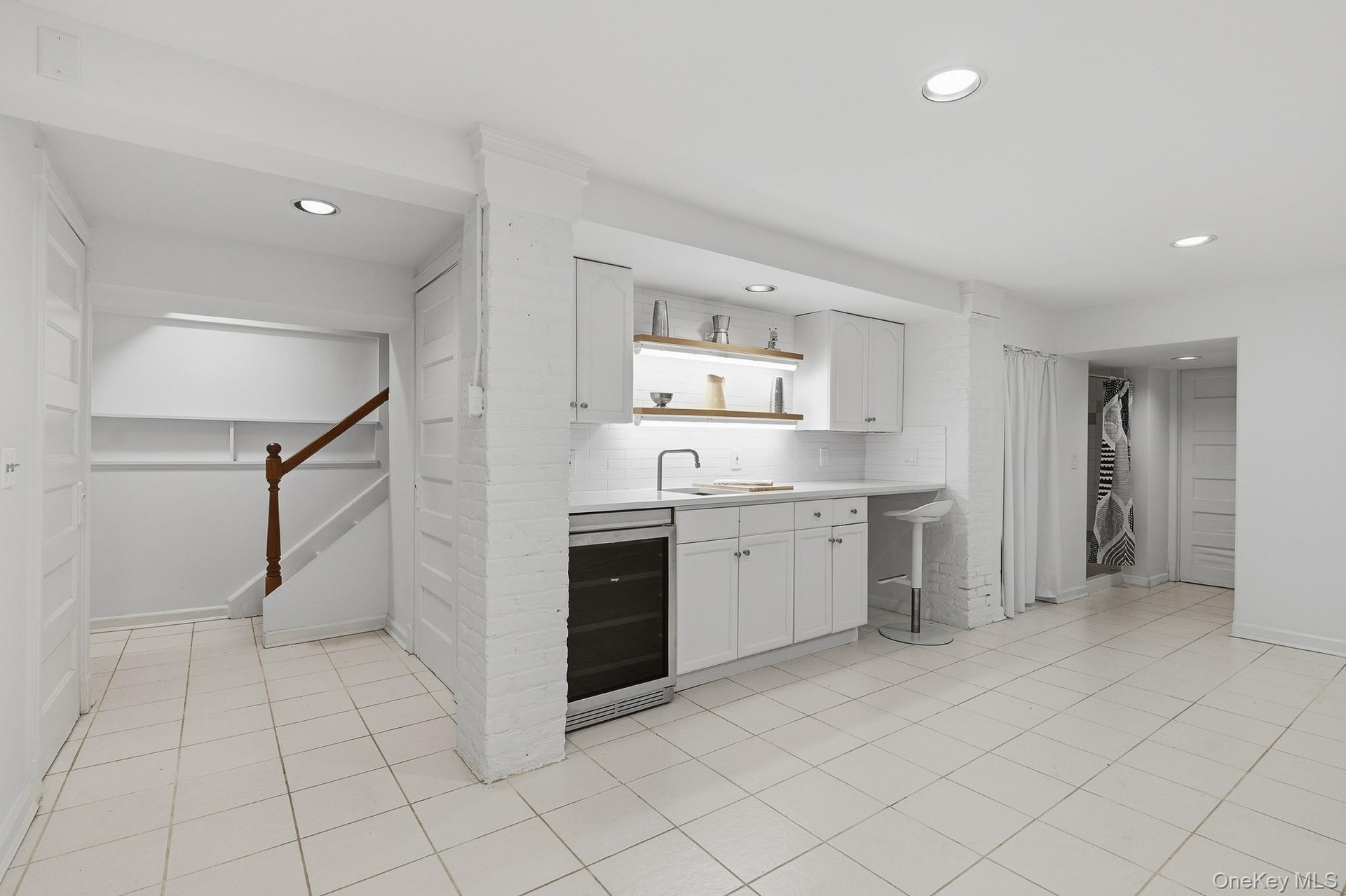 Lower Level with wine refrigerator and workspace